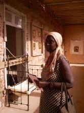 A woman stood in a hallway