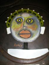 A plate with a drawing of a face