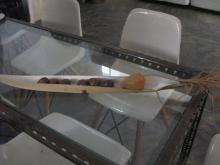 Fruit in a husk on a glass table