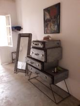 A chest of drawers and a mirror