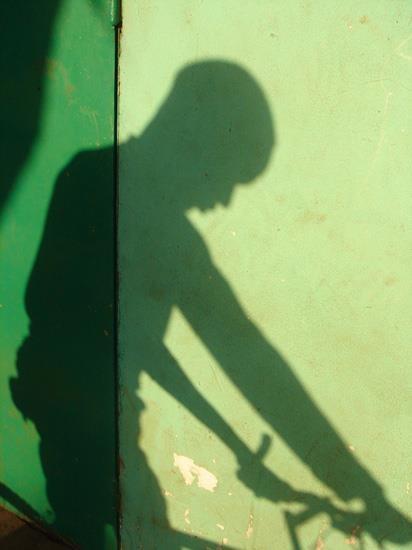 Cyclist and shadow